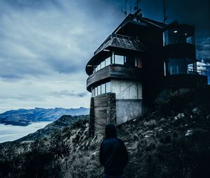 Preview wallpaper house, man, hood, alone, solitude, mountains, christchurch, new zealand