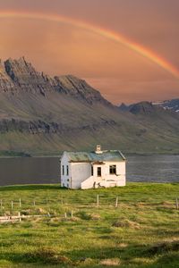 Preview wallpaper house, mountain, rock, rainbow, river, grass, landscape