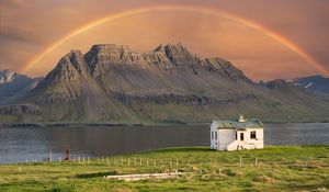 Preview wallpaper house, mountain, rock, rainbow, river, grass, landscape
