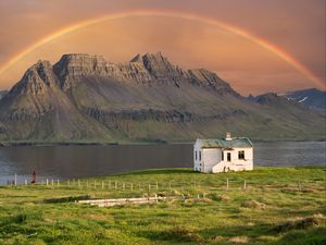 Preview wallpaper house, mountain, rock, rainbow, river, grass, landscape