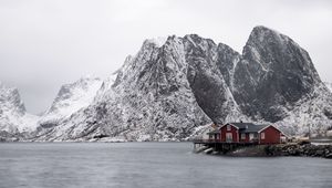 Preview wallpaper house, mountains, island, sea, snow