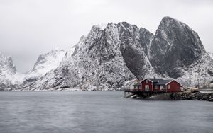 Preview wallpaper house, mountains, island, sea, snow