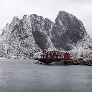 Preview wallpaper house, mountains, island, sea, snow