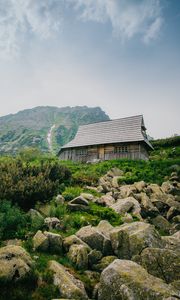 Preview wallpaper house, mountains, nature, stones, slope