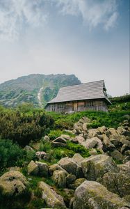 Preview wallpaper house, mountains, nature, stones, slope