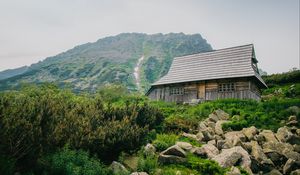 Preview wallpaper house, mountains, nature, stones, slope