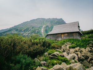 Preview wallpaper house, mountains, nature, stones, slope