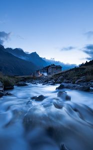 Preview wallpaper house, river, mountains, stones, water, nature