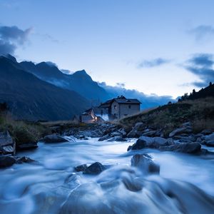 Preview wallpaper house, river, mountains, stones, water, nature