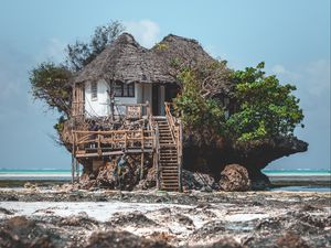 Preview wallpaper house, rock, beach, coast, ocean