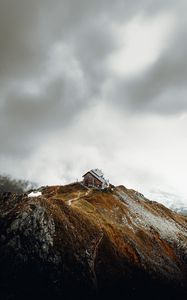 Preview wallpaper house, rocks, cliff, path, clouds