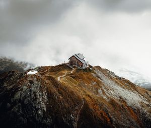 Preview wallpaper house, rocks, cliff, path, clouds