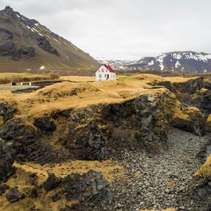 Preview wallpaper house, rocks, island, nature, solitude