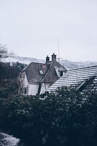 Preview wallpaper house, roof, snow, trees, mountains, winter
