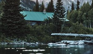 Preview wallpaper house, roof, trees, pond, mountain