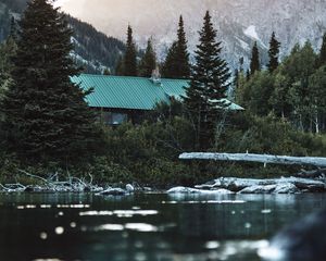 Preview wallpaper house, roof, trees, pond, mountain