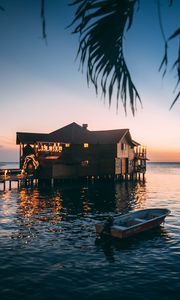 Preview wallpaper house, sea, sunset, branch, water