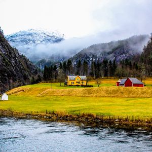 Preview wallpaper house, shore, river, fog, mountains, nature