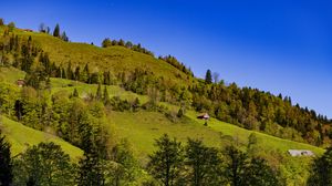 Preview wallpaper house, trees, hill, mountains, sky, nature