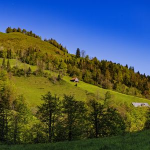 Preview wallpaper house, trees, hill, mountains, sky, nature