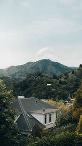 Preview wallpaper house, trees, mountains, nature, aerial view