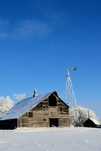 Preview wallpaper house, winter, wind turbine, field