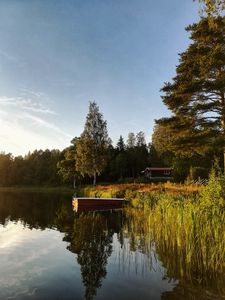 Preview wallpaper houses, boat, lake, forest, sky