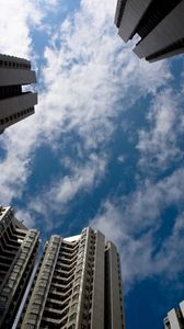 Preview wallpaper houses, bottom view, sky, clouds