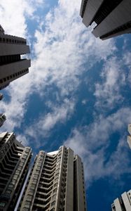 Preview wallpaper houses, bottom view, sky, clouds