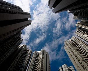 Preview wallpaper houses, bottom view, sky, clouds