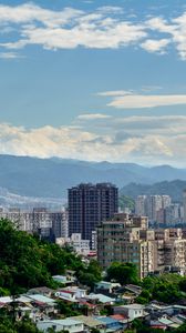 Preview wallpaper houses, buildings, city, trees, mountains, clouds