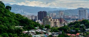 Preview wallpaper houses, buildings, city, trees, mountains, clouds