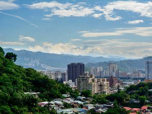 Preview wallpaper houses, buildings, city, trees, mountains, clouds