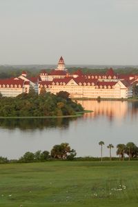 Preview wallpaper houses, buildings, grass, trees, river