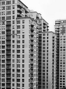 Preview wallpaper houses, buildings, windows, bw, architecture