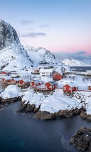 Preview wallpaper houses, coast, mountains, snow, island, sea