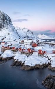 Preview wallpaper houses, coast, mountains, snow, island, sea