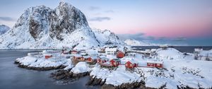 Preview wallpaper houses, coast, mountains, snow, island, sea