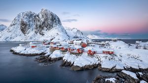 Preview wallpaper houses, coast, mountains, snow, island, sea