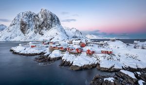 Preview wallpaper houses, coast, mountains, snow, island, sea