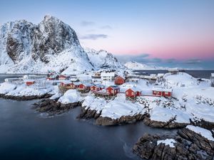 Preview wallpaper houses, coast, mountains, snow, island, sea