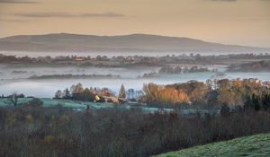 Preview wallpaper houses, hills, trees, fog, aerial view