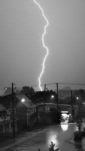 Preview wallpaper houses, lightning, bw, road