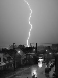 Preview wallpaper houses, lightning, bw, road