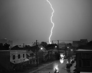 Preview wallpaper houses, lightning, bw, road