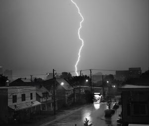 Preview wallpaper houses, lightning, bw, road