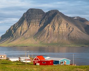 Preview wallpaper houses, mountain, rock, lake, sky