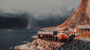 Preview wallpaper houses, mountains, fog, rainbow, lofoten, norway