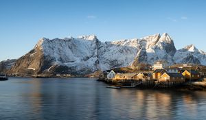 Preview wallpaper houses, pier, mountains, snow, sea