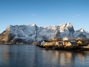 Preview wallpaper houses, pier, mountains, snow, sea